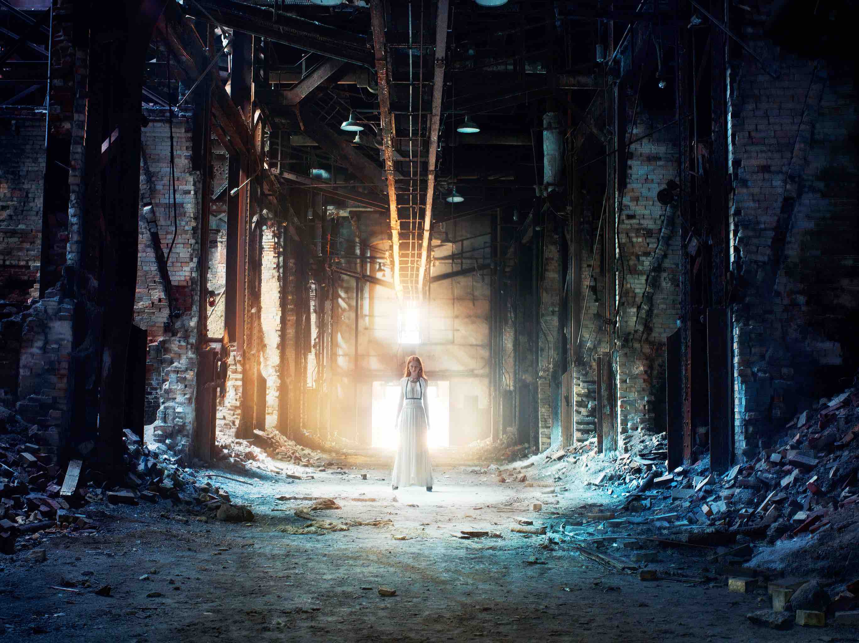Epson campaign in New York, 2007, lighting up a decaying factory building with several 6400ws Broncolor twin heads, placed some 60 feet behind model. (photo by Markus Klinko)