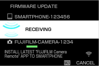 Wait while the smartphone copies the firmware to the camera. (Camera View)